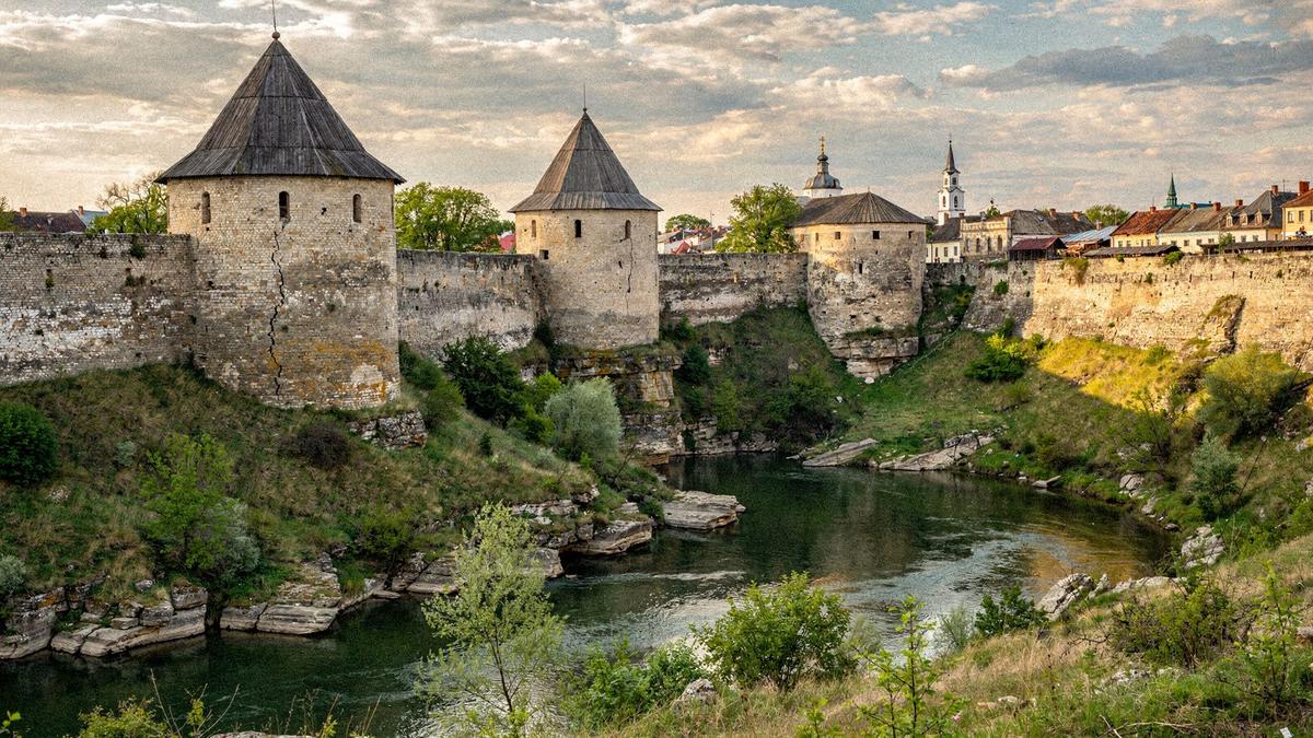 Fortress walls above the river canyon at Kamianets-Podilskyi in afternoon light